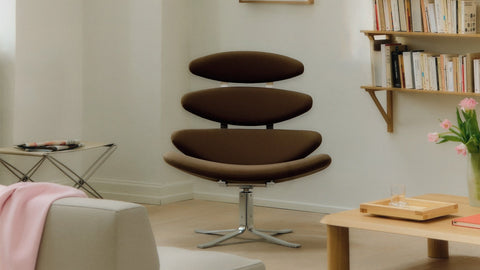 Corona Chair by Poul M. Volther for Fredericia in brown upholstery with stainless steel swivel base, styled in a living room