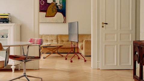 Moon Light TV stand in Burnin' Red by Pedestal in a living room