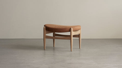 Elizabeth Ottoman by Ib Kofod-Larsen for Audo Copenhagen in oak with leather upholstery
