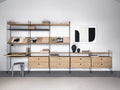 Large String™ shelving system with Magazine Shelves in oak finish, Scandinavian modular storage wall