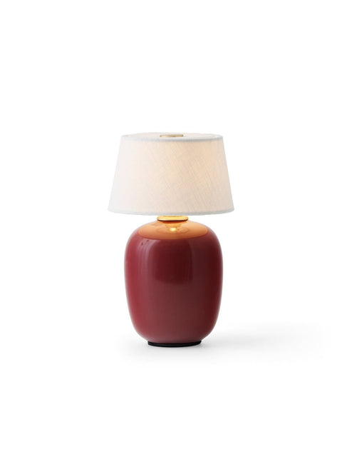 Audo Copenhagen Torso Portable Lamp in Ruby, packshot on white