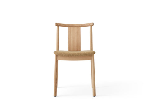 natural oak Merkur Dining Chair with audo boucle 06 fabric designed by Skogstad & Wærnes for audo copenhagen