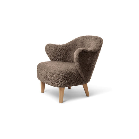 Audo Copenhagen Ingeborg Lounge Chair in Natural Oak with Sheepskin Sahara, packshot on white
