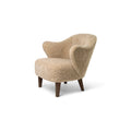 Audo Copenhagen Ingeborg Lounge Chair in Dark Stained Oak with Sheepskin Honey, packshot on white