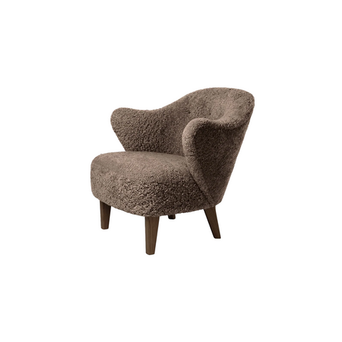 Audo Copenhagen Ingeborg Lounge Chair in Dark Stained Oak with Sheepskin Sahara, packshot on white