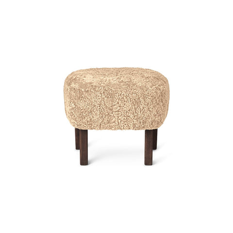 Audo Copenhagen Ingeborg Ottoman in Dark Stained Oak with Sheepskin Honey, packshot on white