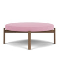 passage pouf by audo copenhagen finished in walnut and vidar pink fabric