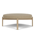 Passage Pouf Ottoman by audo copenhagen finished in natural oak and audo boucle fabric