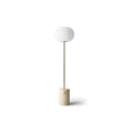 Audo Copenhagen JWDA Floor Lamp in Travertine and Brushed Brass, 51" high, packshot on white