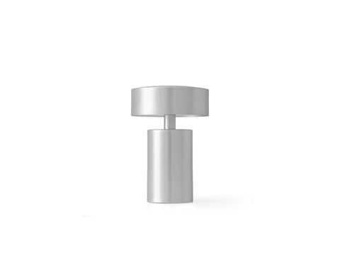 aluminum table portable lamp designed by norm architects for audo copenhagen