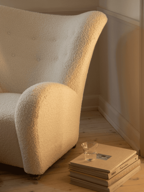 Audo Copenhagen The Tired Man Lounge Chair in a styled interior