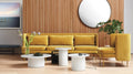 Blu Dot Bloke 95" Sofa with chaise in ochre velvet styled in a warm modern living room with wood slat wall
