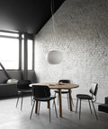 soborg chair with upholstered black leather seat and backrest designed by borge mogensen for fredericia furniture