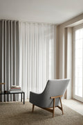 Fredericia Jens Risom Lounge Chair 6540 in light grey fabric with oak base in a Scandinavian living room