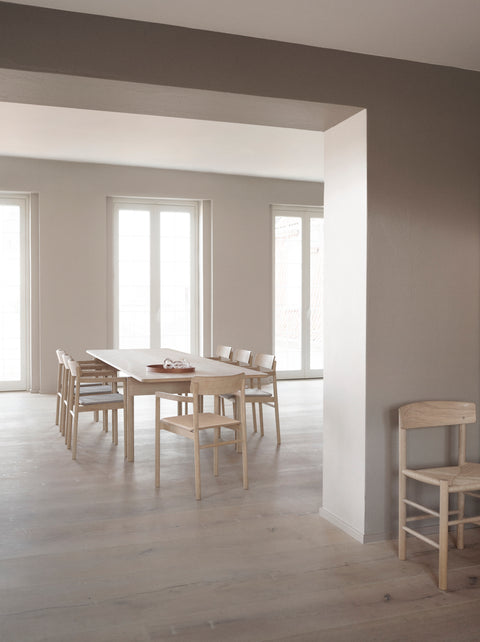 post dining table and post dining chairs designed by cecile manz for fredericia furniture