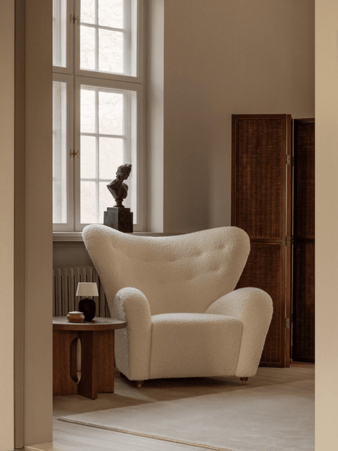 Audo Copenhagen The Tired Man Lounge Chair in a styled interior