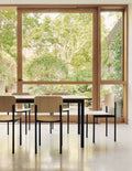 Plan chair in a scandinavian and scenic dining room by fredericia furniture