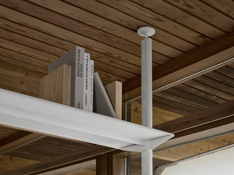 String Furniture Pira pole fixed to a wood slat ceiling, floor to ceiling mounting detail