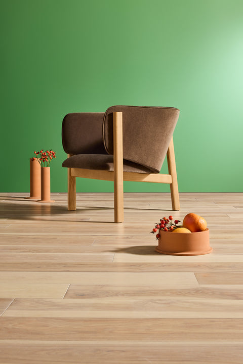 Blu Dot All In Lounge Chair rear detail in brown velvet with natural oak frame against a green wall