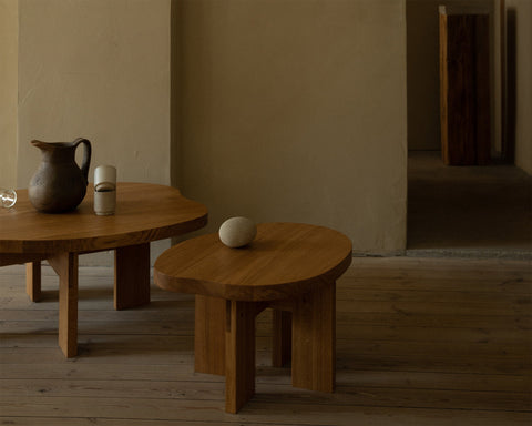 Frama Farmhouse Side Table in Natural Oak, two oak tables of different heights holding a jug, cups and a pale stone ball