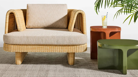 Loophole Outdoor Lounge Chair by Blu Dot in Sunbrella Stucco, styled with Circula side tables