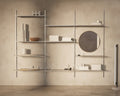 Frama Shelf Library Triple Section in Stainless Steel, steel shelves across three bays holding bowls, boxes and a round mirror