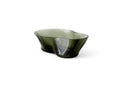 Tinted glass bowl with an organic shape