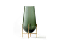 echasse vase designed by theresa rand in brushed brass metal base and smoked glass vase by audo copenhagen