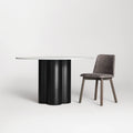 Blu Dot 4/4 Round Dining Table 48-inch with marble top and black on ash base on white background