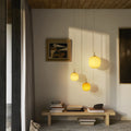 vl 45 pendants in a cluster lifestyle image by Louis Poulsen 