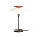 PH-80 Table Lamp in chrome finish with red top shade illuminated against black background