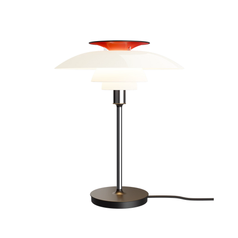PH-80 Table Lamp in chrome finish with red top shade illuminated against black background
