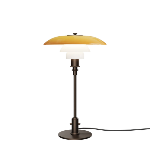 Louis Poulsen PH 3/2 Table Lamp Centenary Edition with amber upper shade, opal white lower shades, and aged brass stem on black background