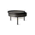 Audo Copenhagen Turning Table in Black Ash and Brass, packshot on white