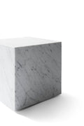 white cubic marble end table designed by norm architects for audo copenhagen