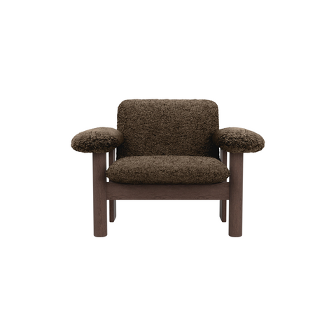Audo Copenhagen Brasilia Lounge Chair, Low Back in Dark Stained Oak with Sheepskin Root, packshot on white