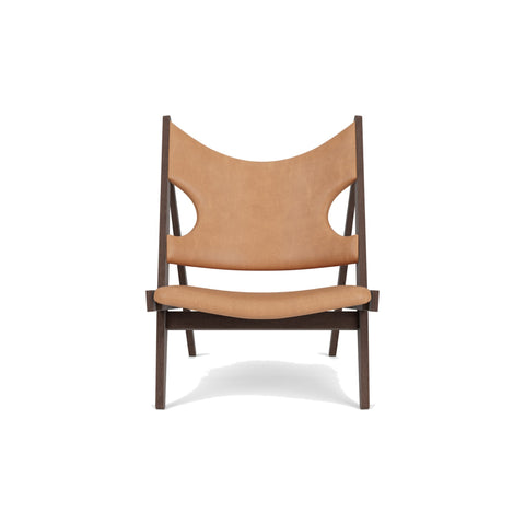 Audo Copenhagen Knitting Lounge Chair in Dark Stained Oak and Cognac Dunes, packshot on white