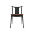 Audo Copenhagen Merkur Dining Chair in Black Oak with Aida 0329 seat, packshot on white