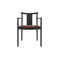 Audo Copenhagen Merkur Dining Chair w/ Armrests in Black Oak with Aida 0329 seat, packshot on white