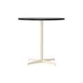 Audo Copenhagen Nook Dining Table 32"Ø in Ivory and Black Oak Veneer, packshot on white
