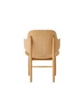 Audo Copenhagen The Penguin Wooden Lounge Chair in a styled interior