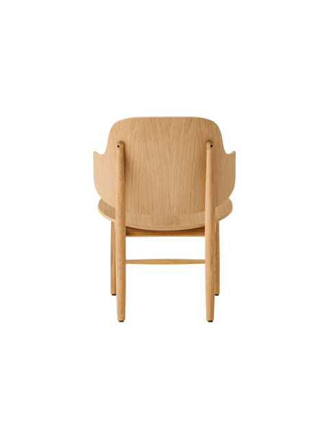 Audo Copenhagen The Penguin Wooden Lounge Chair in a styled interior