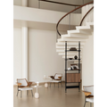 String Furniture Pira freestanding shelving in black grey with a walnut magazine shelf in a bright space