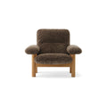 Audo Copenhagen Brasilia Lounge Chair in Natural Oak with Sheepskin Root, packshot on white