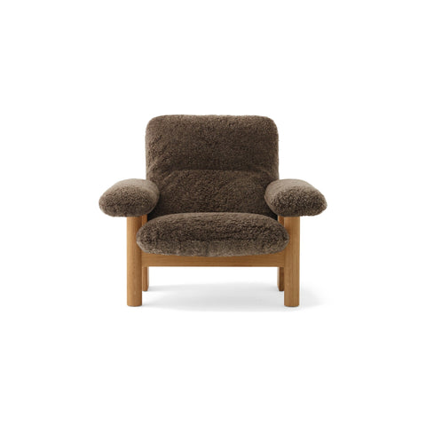 Audo Copenhagen Brasilia Lounge Chair in Natural Oak with Sheepskin Root, packshot on white
