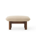 brasilia lounge ottoman with dark stained base and boucle fabric designed by Anderssen & Voll for audo copenhagen