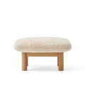 brasilia lounge ottoman with natural oak base and sheepskin upholstery designed by Anderssen & Voll for audo copenhagen