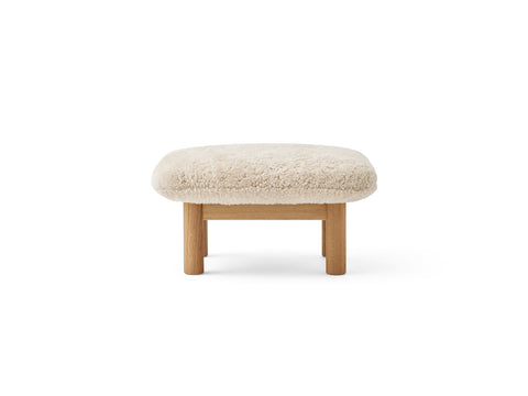 brasilia lounge ottoman with natural oak base and sheepskin upholstery designed by Anderssen & Voll for audo copenhagen