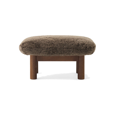 Audo Copenhagen Brasilia Ottoman in Dark Stained Oak with Sheepskin Root, packshot on white