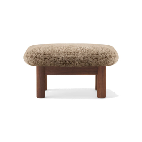Audo Copenhagen Brasilia Ottoman in Walnut with Sheepskin Sahara, packshot on white